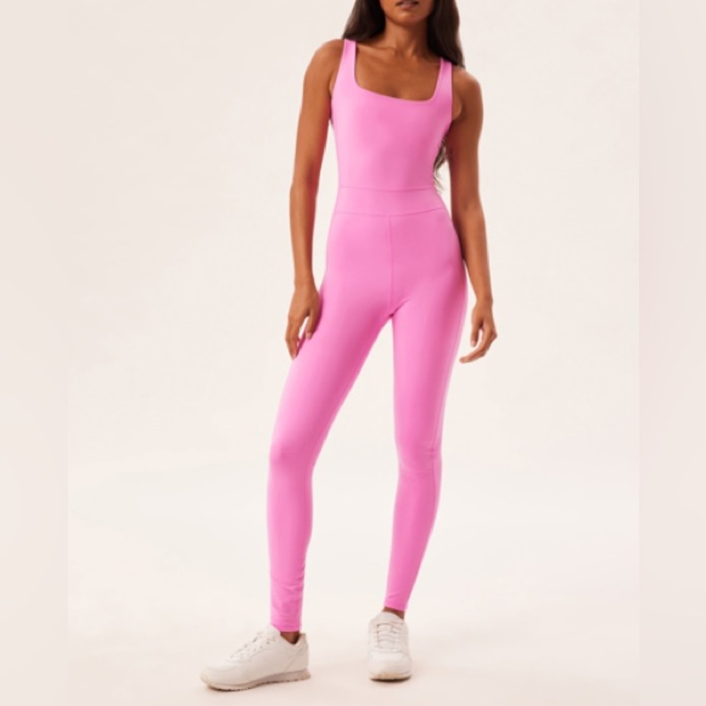 NWT Girlfriend Collective bubblegum pink luxe paneled unitard in size M